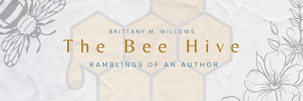 A newsletter header with a crumpled paper texture, a light gray bumblebee in the top left corner, and light gray flowers in the lower right. A pale yellow honeycomb design can be seen behind the text, which reads "The Bee Hive" in dark yellow with "Brittany M. Willows" and "ramblings of an author" written in smaller blue font above and below