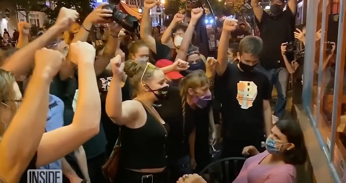 A group of people with their hands up Description automatically generated A group of people with their hands up Description automatically generated