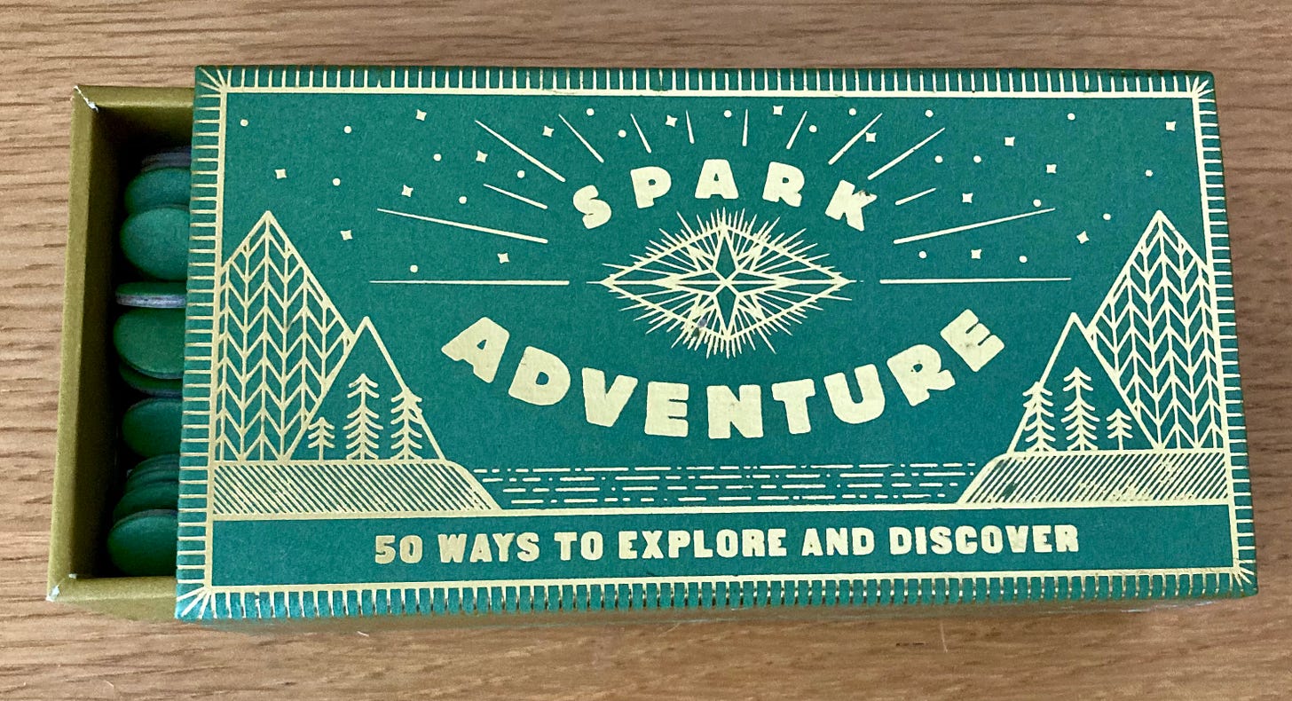 fake matchbox labelled Spark Adventure