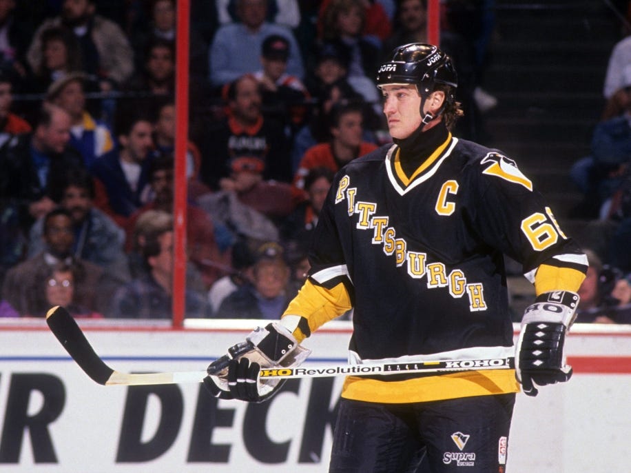 Mario Lemieux #66 of the Pittsburgh Penguins skates on the ice in his first game back from radiation treatment in 1993