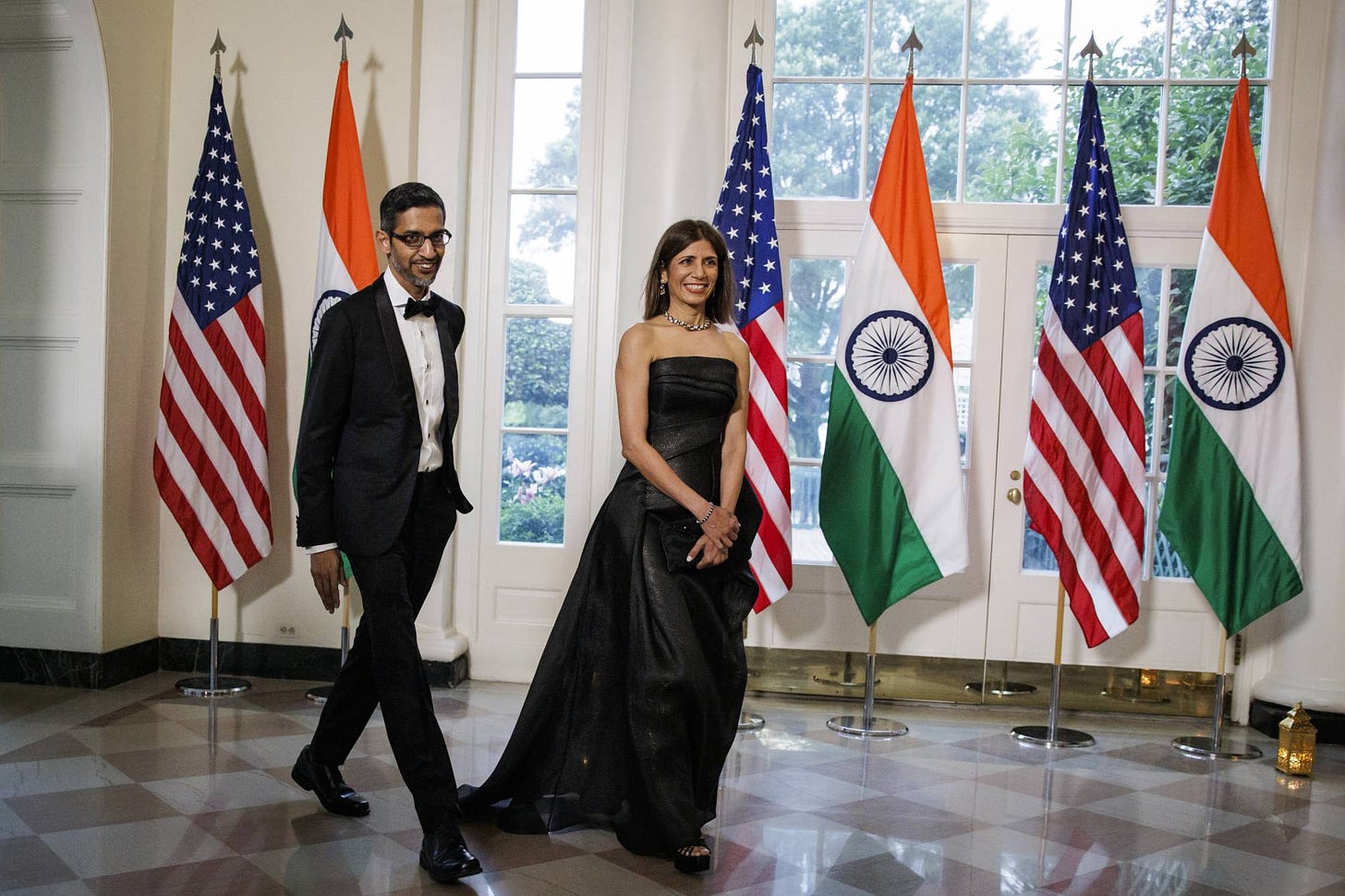 Sundar Pichai, chief executive of Alphabet, and his wife Anjali arrive for a state dinner at the White House in honor of Prime Minister Narendra Modi of India on June 22. | SAMUEL CORUM / THE NEW YORK TIMES