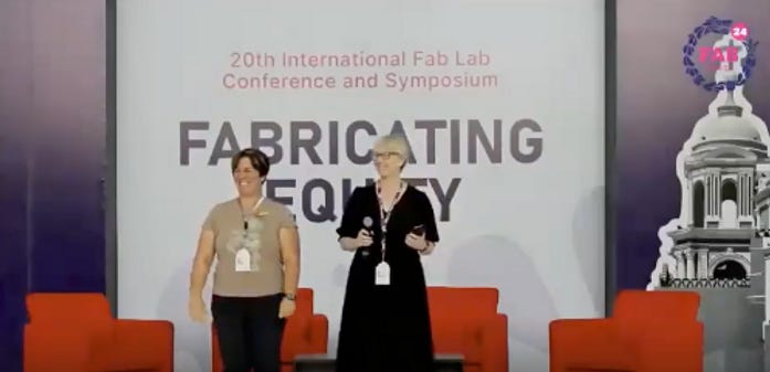Accepting recognition from Dr. Cindy Solomon for the Best Research Paper Award at Fab 24
