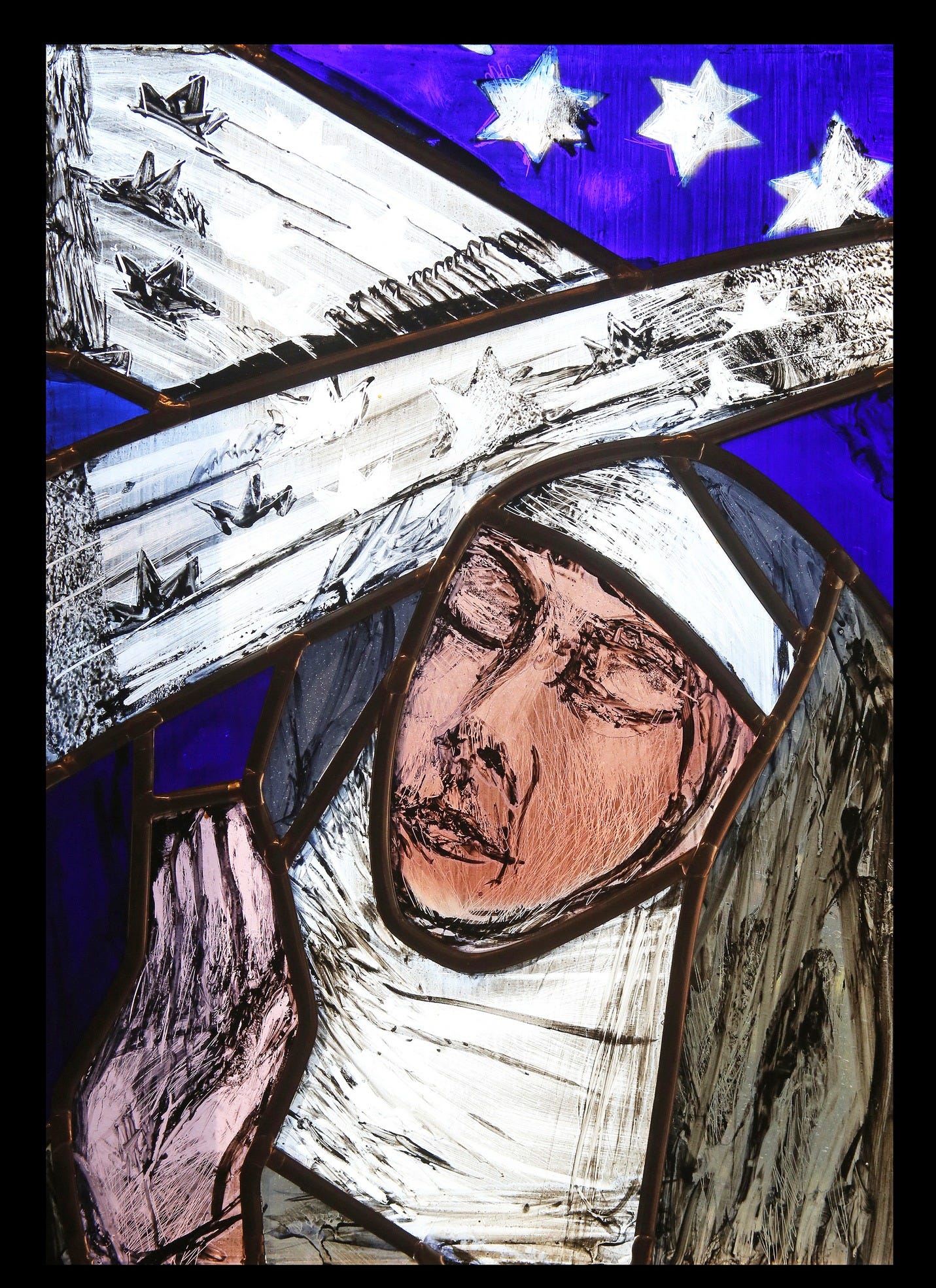 a stained glass rendering of St. Hildegard Van Bingen