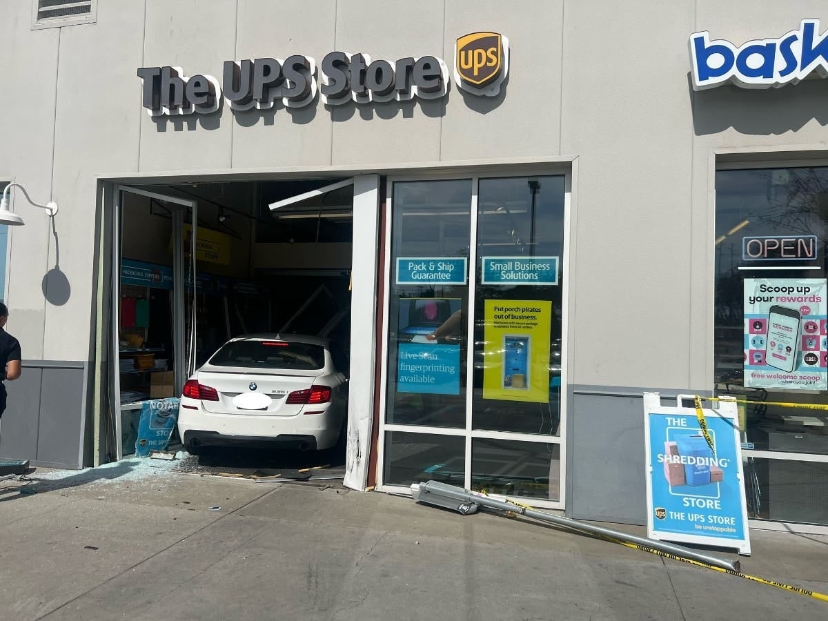 A white sedan drove into the front of the UPS Store in the 2600 block of Blanding Avenue on Tuesday, March 25, 2025, in Alameda, Calif. 