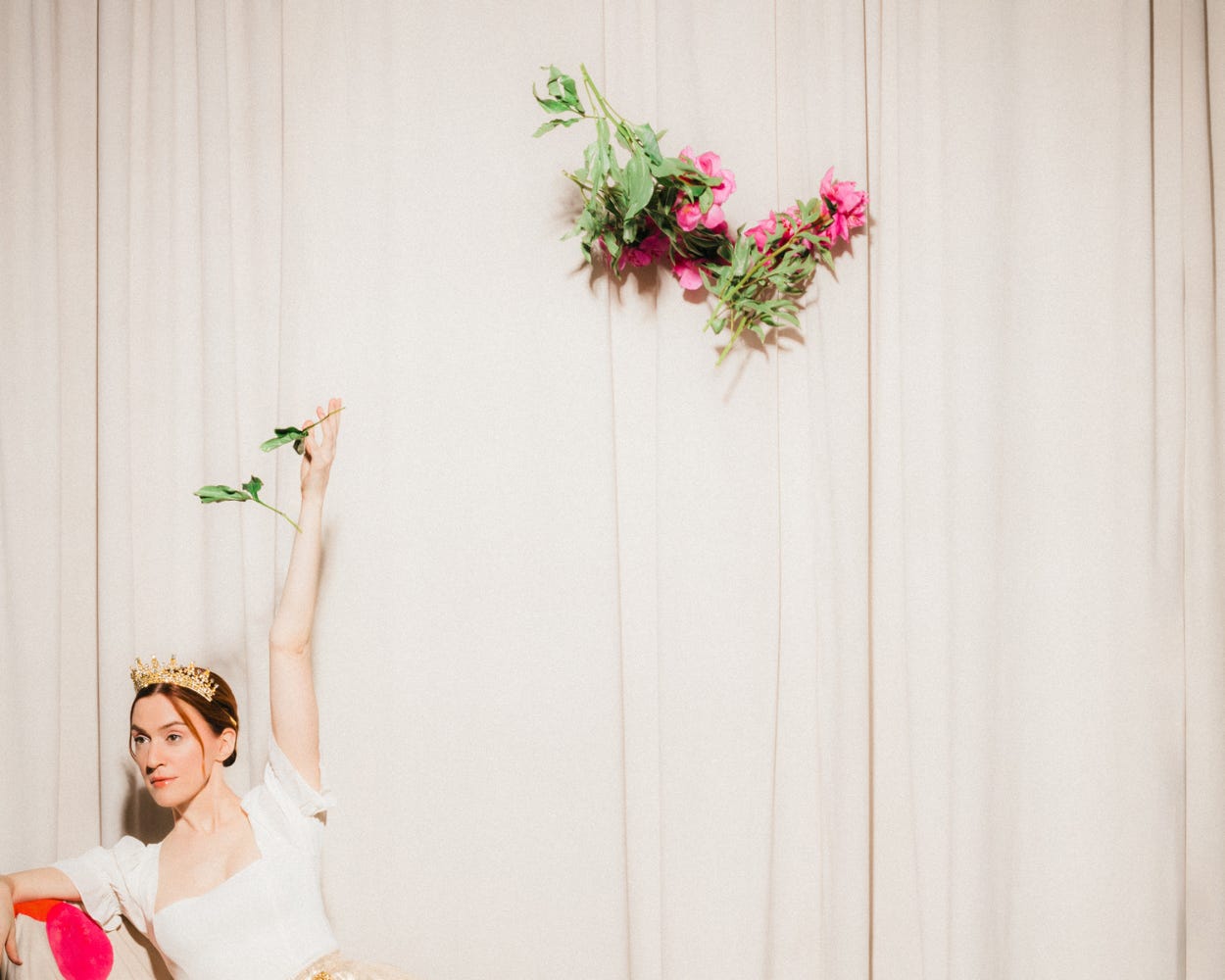 A photo of Cate Scott Campbell tossing flowers, by Mandee Johnson.