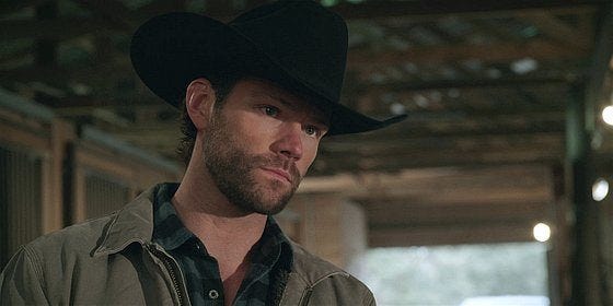 Walker Cordell giving Bonham concerned look in barn.