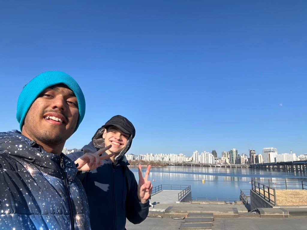 Two men taking a selfie

Description automatically generated