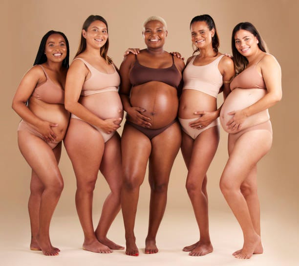 pregnancy, diversity and portrait of friends in studio for community, motherhood and prenatal wellness. maternity, love and pregnant women showing their baby bump stomach together by beige background - pregnant bildbanksfoton och bilder