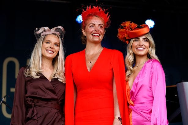 Style Award winner Donna Mulligan (centre) with Helen Flanagan (left) and Emily Rose Moloney on Ladies Day at the Grand National 2022