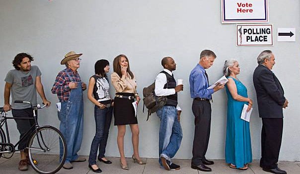 voters waiting in line at polling place - voting stock pictures, royalty-free photos & images