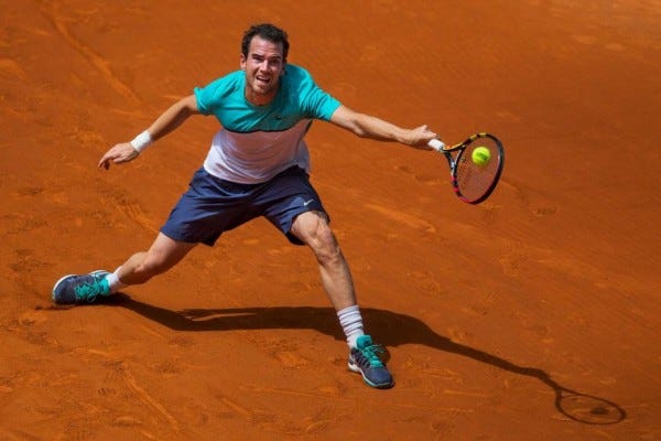 adrian mannarino struggles with john isner at madrid open 2015