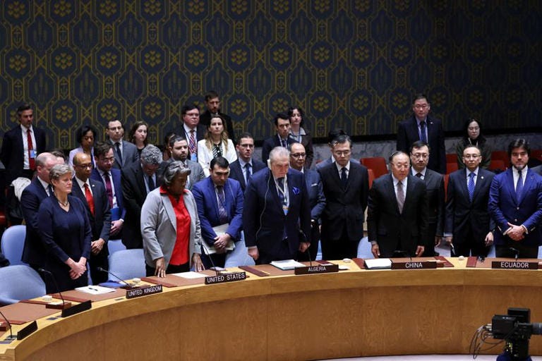 Members of the United Nations Security Council stand in silence, in honor of the victims of the Crocus City Hall concert venue Moscow attack, on the day of a vote on a Gaza resolution that demands an immediate ceasefire for the month of Ramadan leading to a permanent sustainable ceasefire, and the immediate and unconditional release of all hostages, at U.N. headquarters in New York City, U.S., March 25, 2024. REUTERS/Andrew Kelly