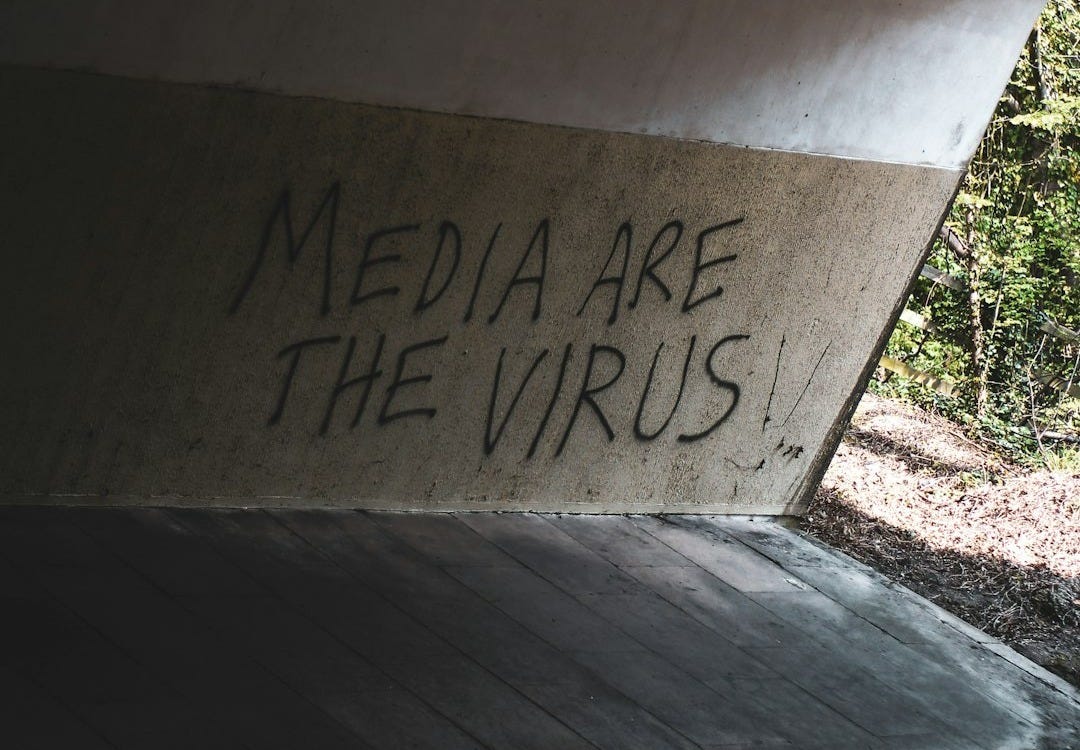 Media graffiti on bridge