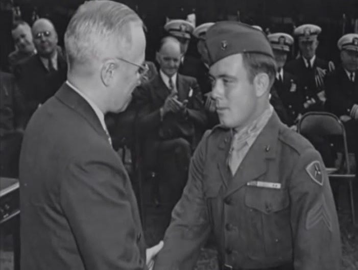 Williams receives his Medal from Truman.