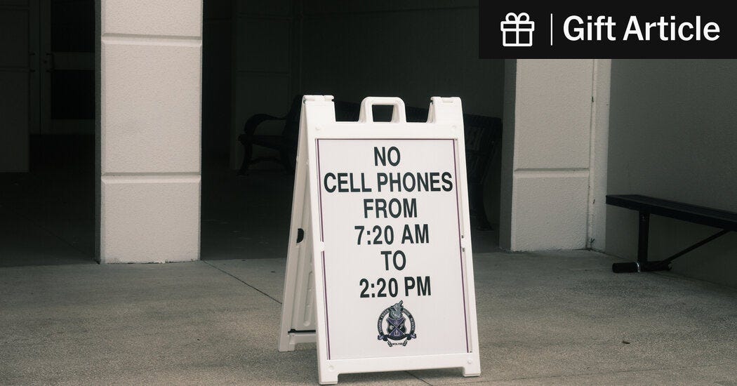A cell phone ban sign in the courtyard of Timber Creek High School in Orlando, Fla.
