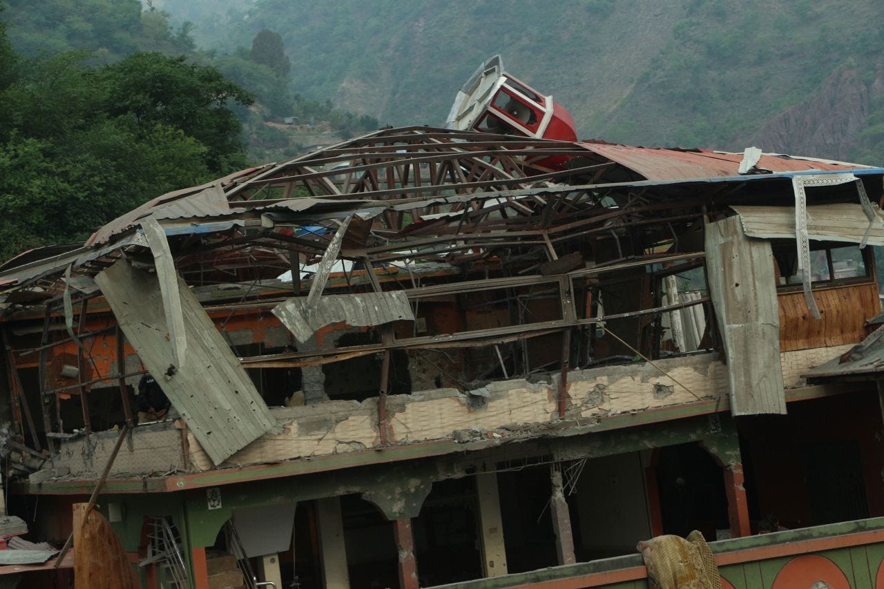 The aftermath of an Indian strike on Bilal Mosque in Muzaffarabad, Pakistan-administered Kashmir, on Wednesday.