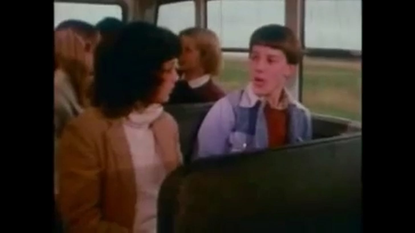 Tracy manifests on a crowded bus. Not a good sign!