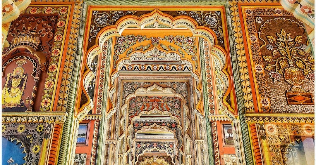 a colorful building with intricately painted walls and ceilings