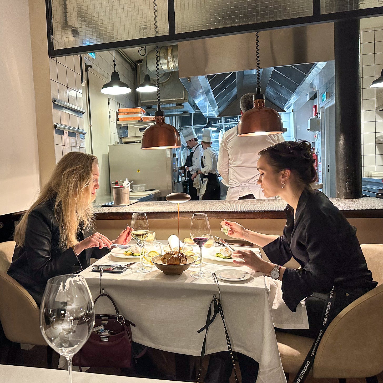 Open kitchen at Amalia restaurant in Paris