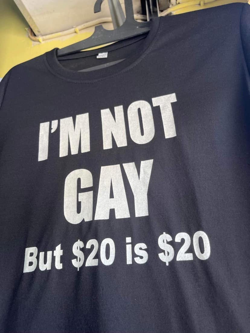 May be an image of text that says 'I'M NOT GAY But $20 is $20'