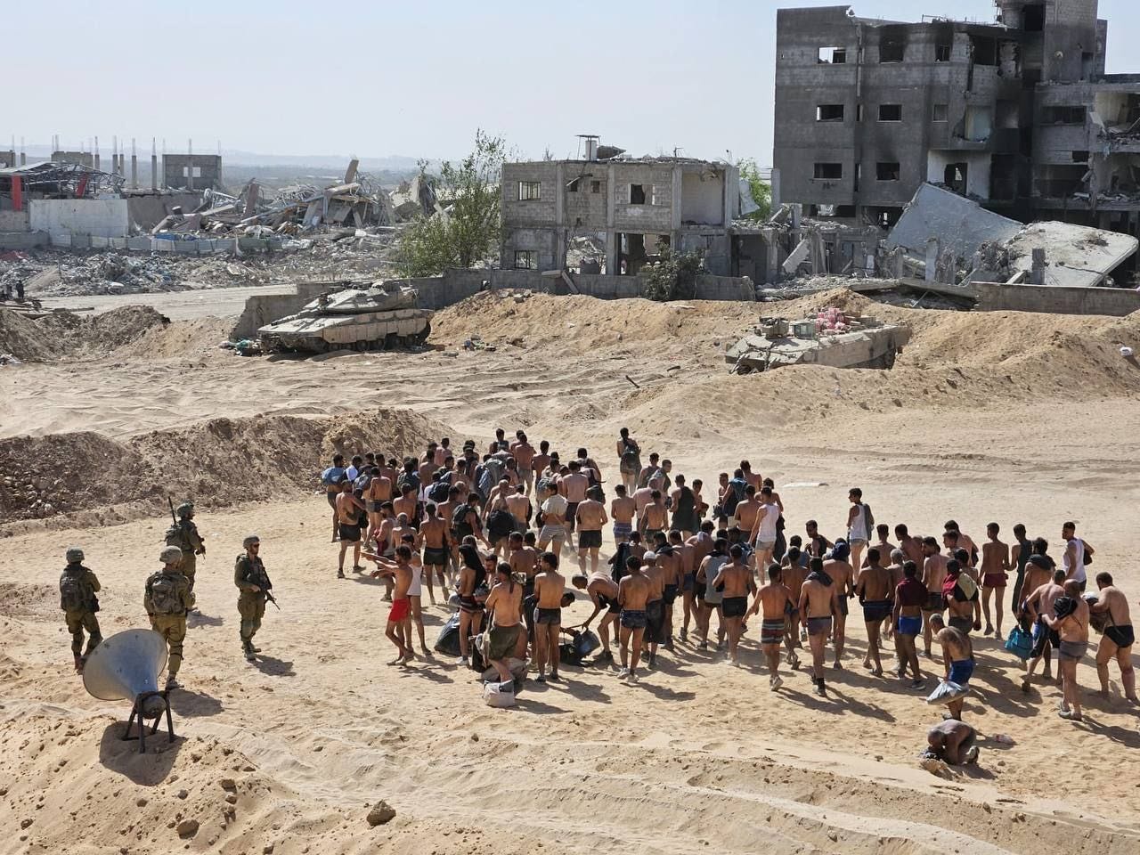 Dozens of people from Kamal Adwan Hospital in northern Gaza.