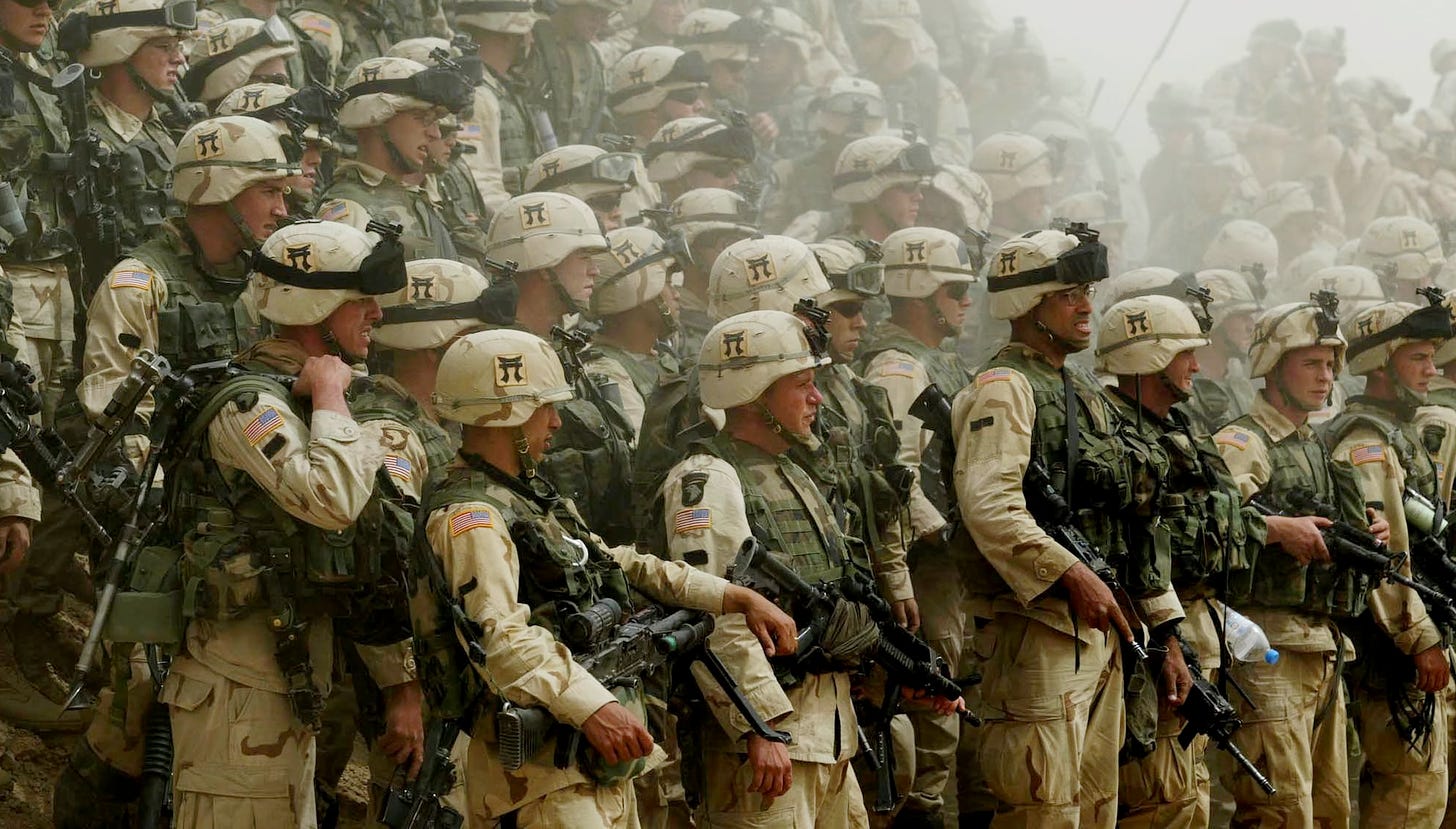 Soldiers from the 3rd Brigade of the 101st Airborne, Kuwaiti desert, March 20, 2003. 