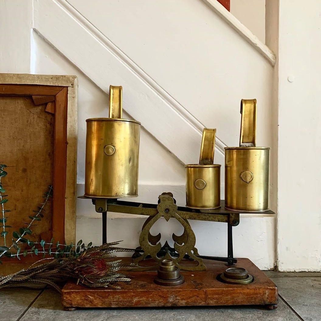 brass measuring cups via reclectic vintage interiors