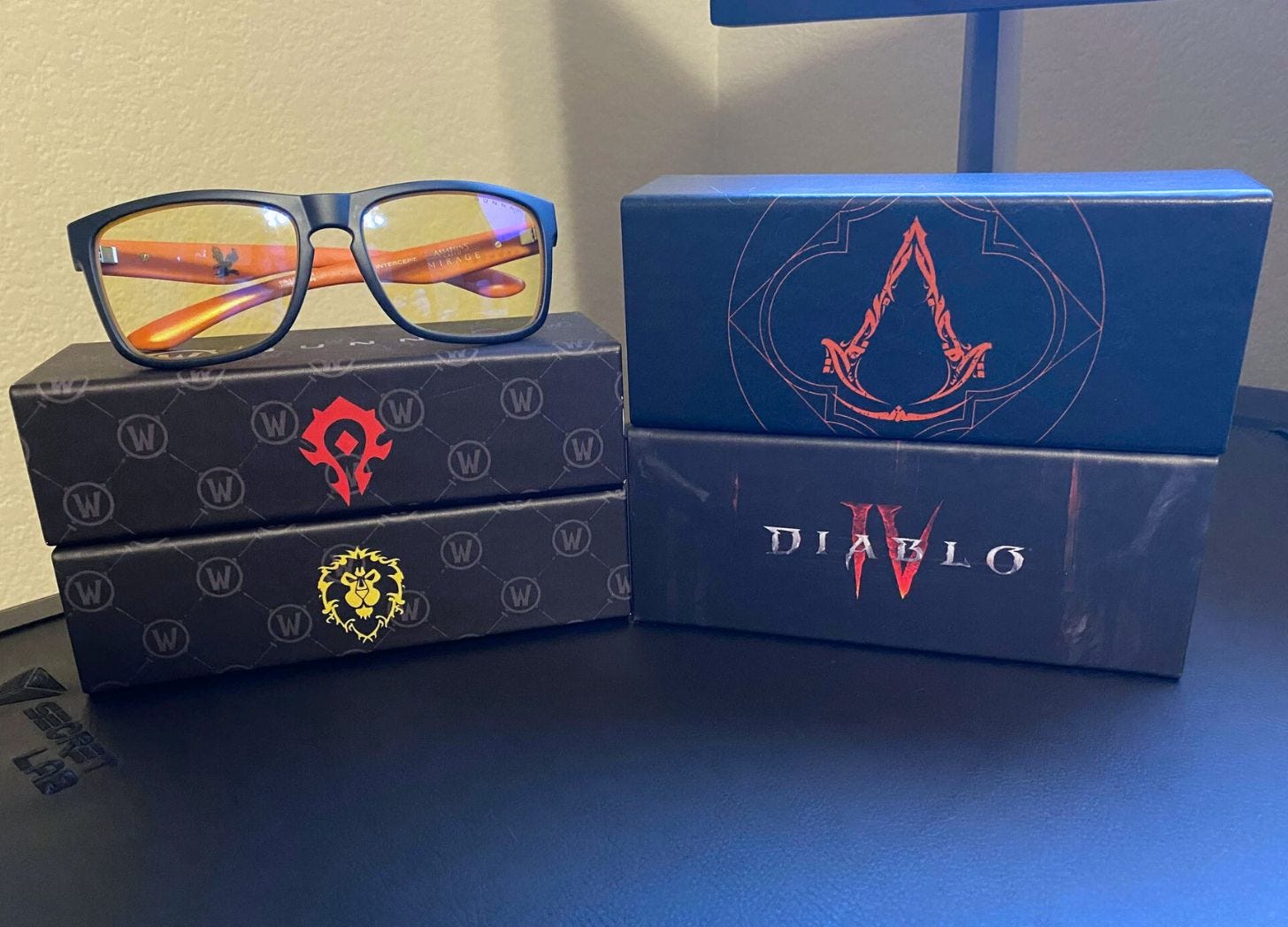 Collection of GUNNAR Optik Glasses in Assassin's Creed, Diablo IV, and WarCraft branding
