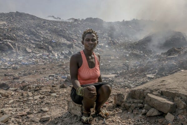 Zainab Sakoteh sits in the Kingtom landfill in Freetown, Sierra Leone, Thursday, March 13, 2025, a place she frequents to meet the cartel that provide her with Kush. (AP Photo/Caitlin Kelly) Zainab Sakoteh sits in the Kingtom landfill in Freetown, Sierra Leone, Thursday, March 13, 2025, a place she frequents to meet the cartel that provide her with Kush. (AP Photo/Caitlin Kelly)