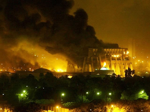 Baghdad burns during an early bombing campaign of the Iraq War (REUTERS)