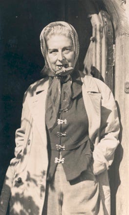 Self-portrait (with Nazi badge between her teeth) by Claude Cahun, 1945. Jersey Heritage Collections © Jersey Heritage