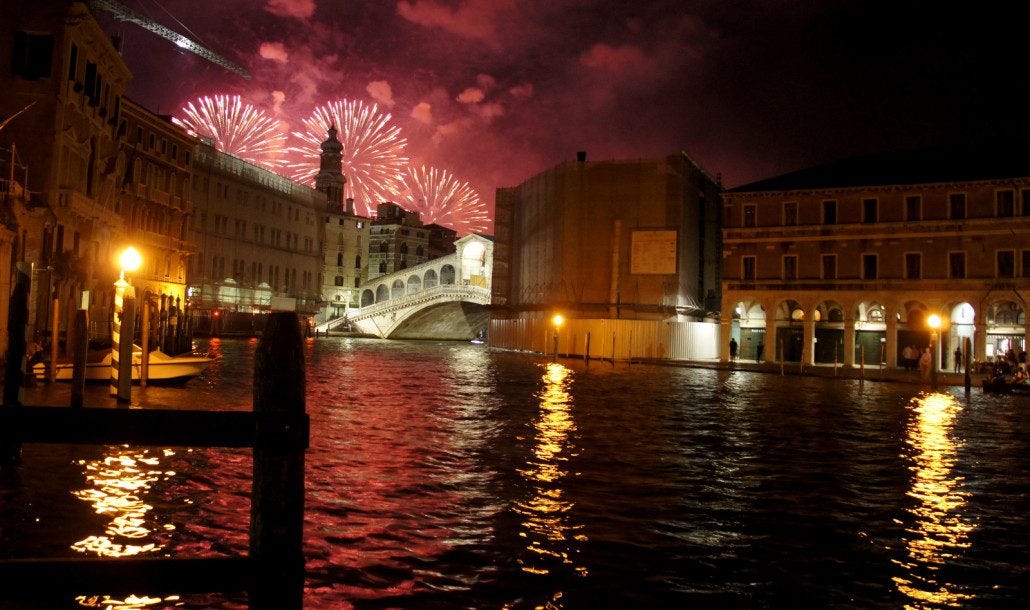 Fireworks over the canals of Venice. We happened to be in town for a yearly festival.