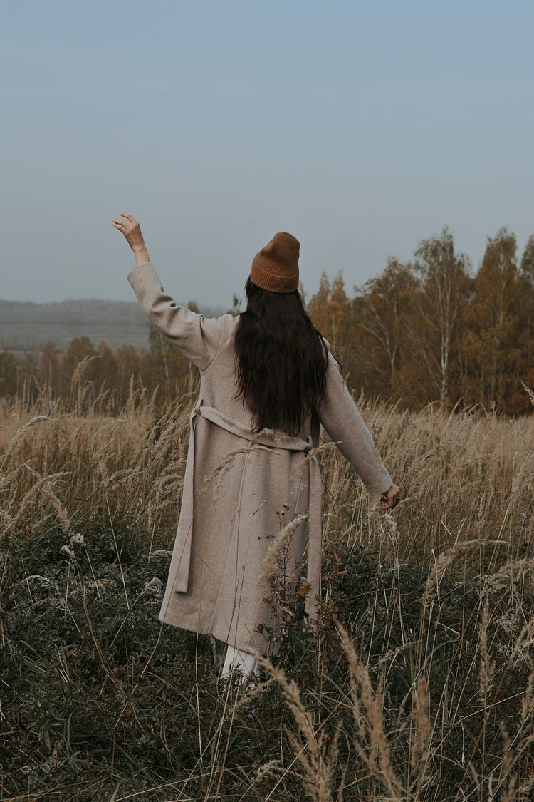 woman in a field.