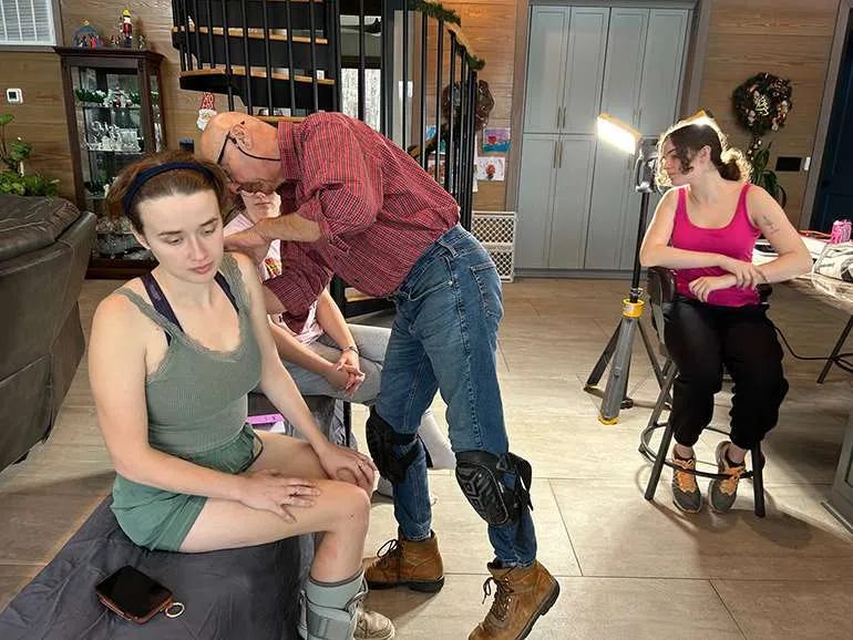 Michael Simmons (standing) prepares a cast member for a makeup test in preparation for the upcoming run of 'Alabaster.' Michael Simmons (standing) prepares a cast member for a makeup test in preparation for the upcoming run of 'Alabaster.'