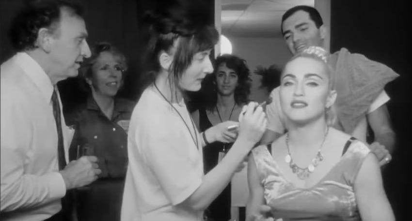 Madonna and Christopher backstage at Blond Ambition talking to their parents