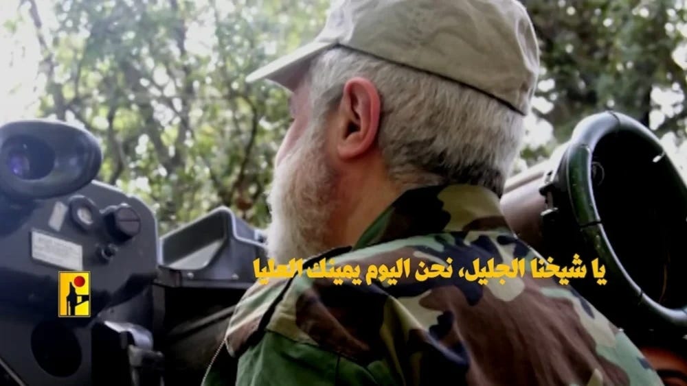 Hezbollah Secretary-General Sheikh Naim Qassem donning military fatigues in an undisclosed location, screengrabbed from a video released by Hezbollah's media wing on November 9, 2024  (Islamic Resistance in Lebanon Military Media)