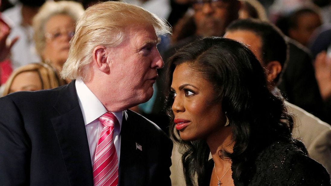 donald trump whispering to omarosa