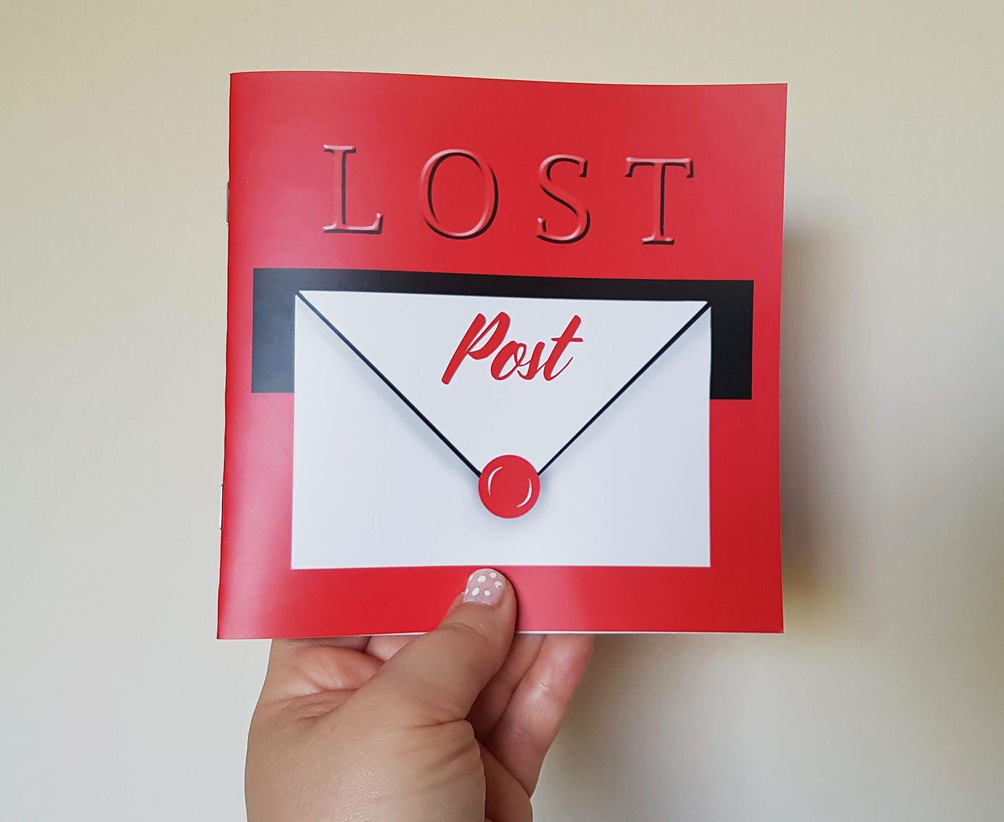 Cover of Lost Post, which looks like a red post box with a white envelope being posted through the slot.