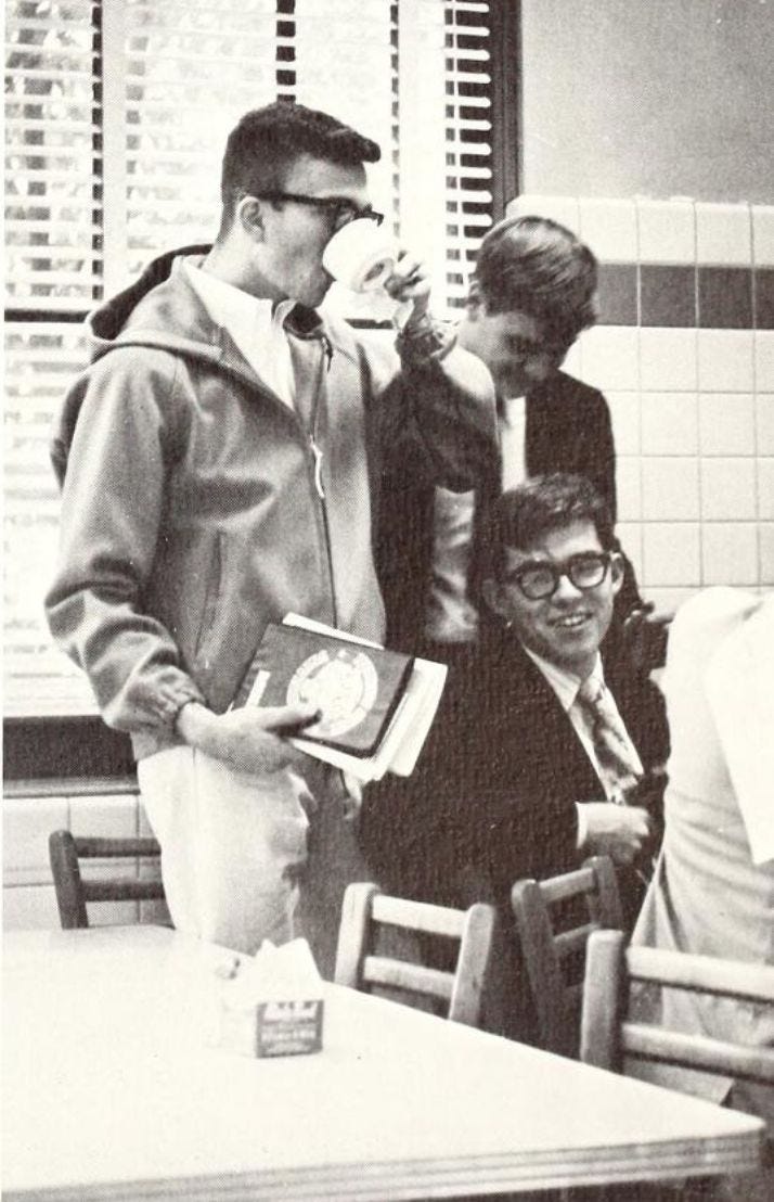 This may contain: an old black and white photo of three people standing around a table with drinks in their hands