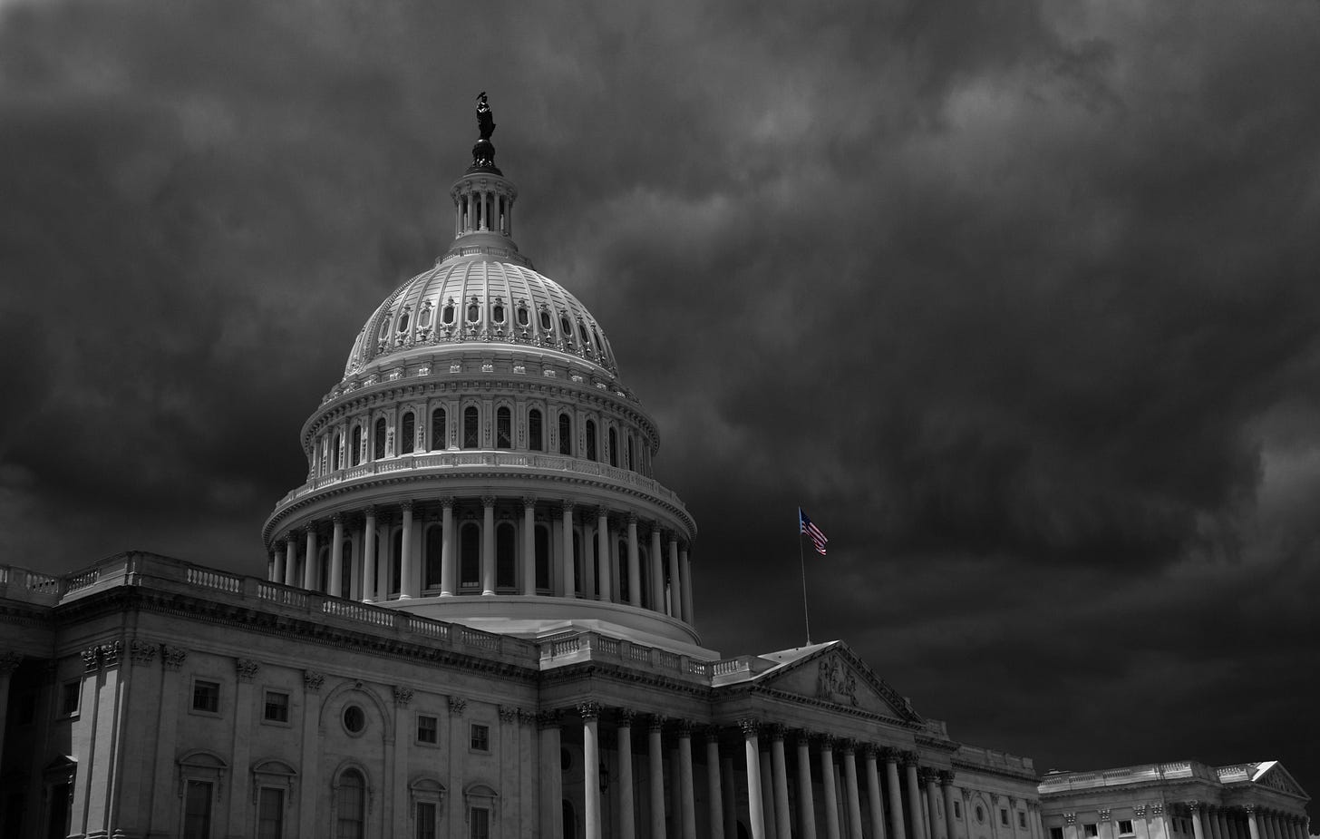 Capitol building with storm clouds overhead