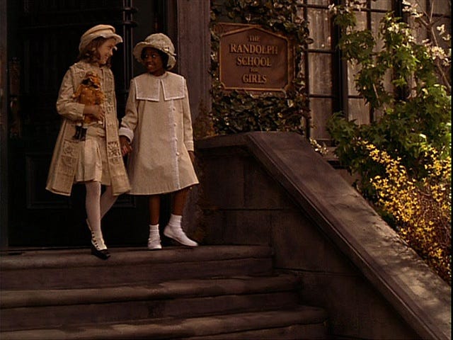 Sara and Becky leaving the Seminary at the end of A Little Princess.