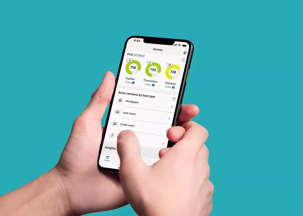 Person checking their FICO Score on a mobile phone
