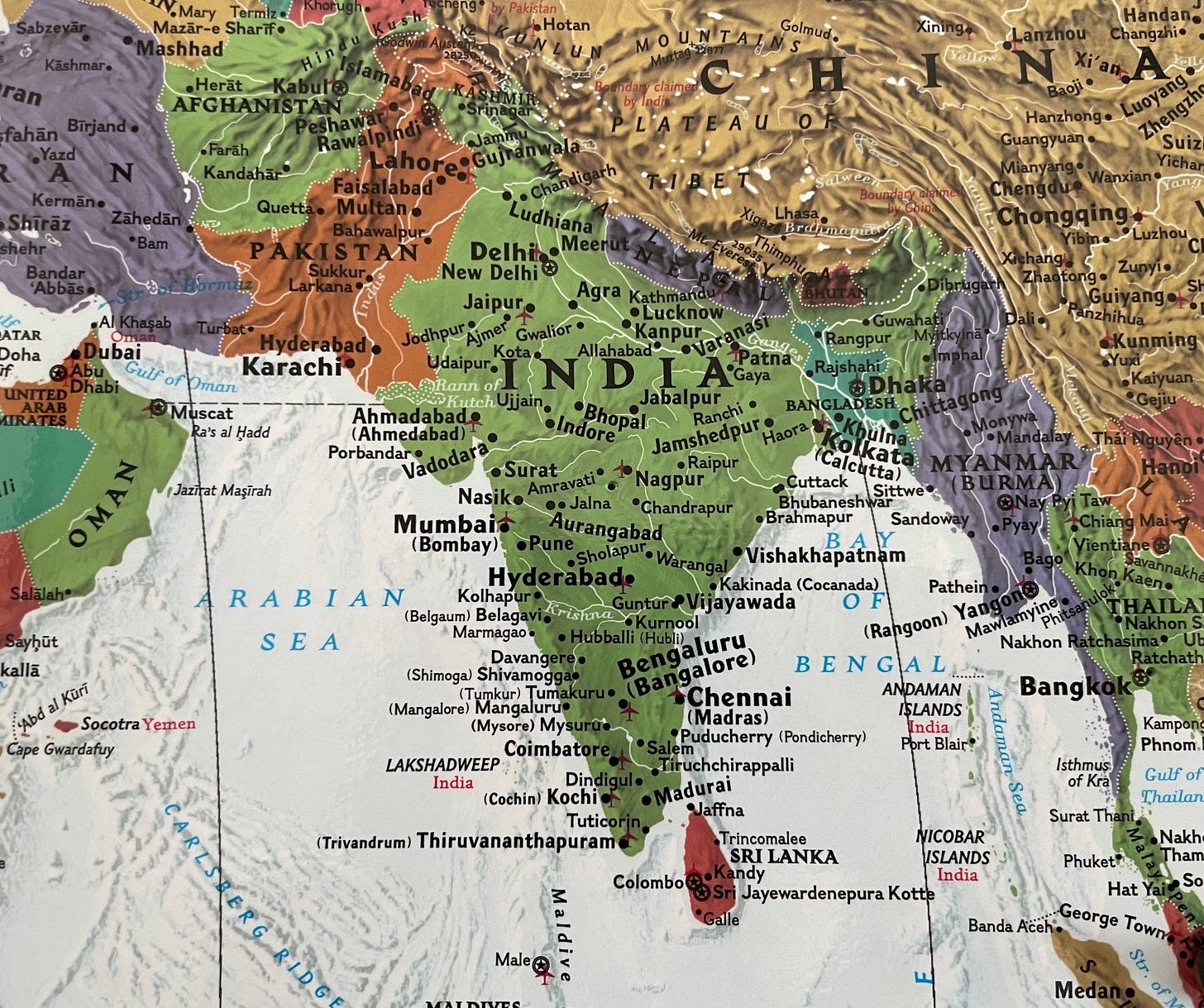 A map of the world, zoomed in on India, shown in green. Other countries are shown in blue, red, orange, green, purple, and yellow.