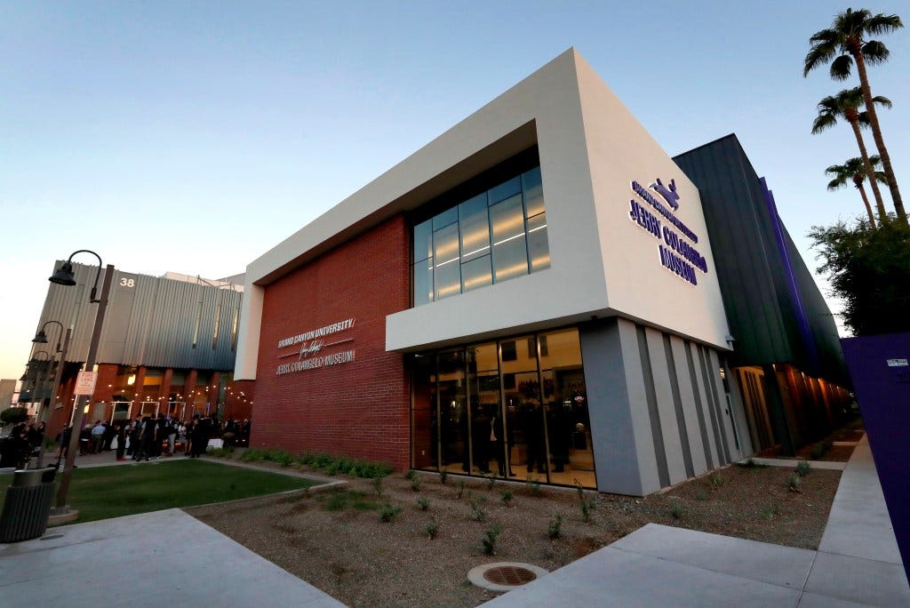 The Jerry Colangelo Museum at Grand Canyon University is seen at at dusk in Phoenix