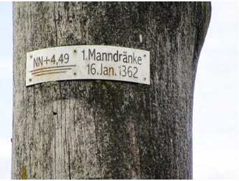 A sign showing how high the Manndränke flood was.