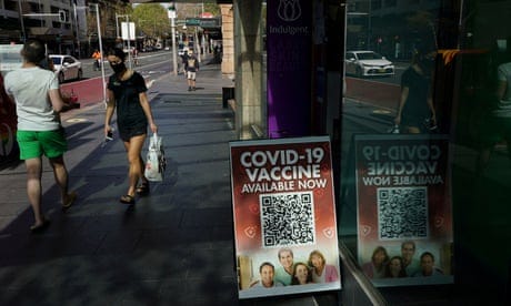 A Covid vaccination sign outside a pharmacy in the Sydney’s CBD