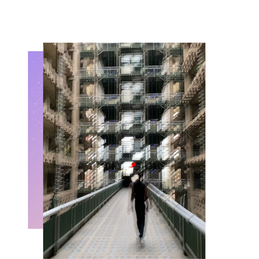 Two images, the first being a purple gradient-flecked border on the left side of the main image. The second is a blurry photo that feels dizzying. A loved one is walking down the walkway of a building filled with earthen and green tones, but you can barely make out their figure. There is a red light ahead. Nothing looks fixed. 