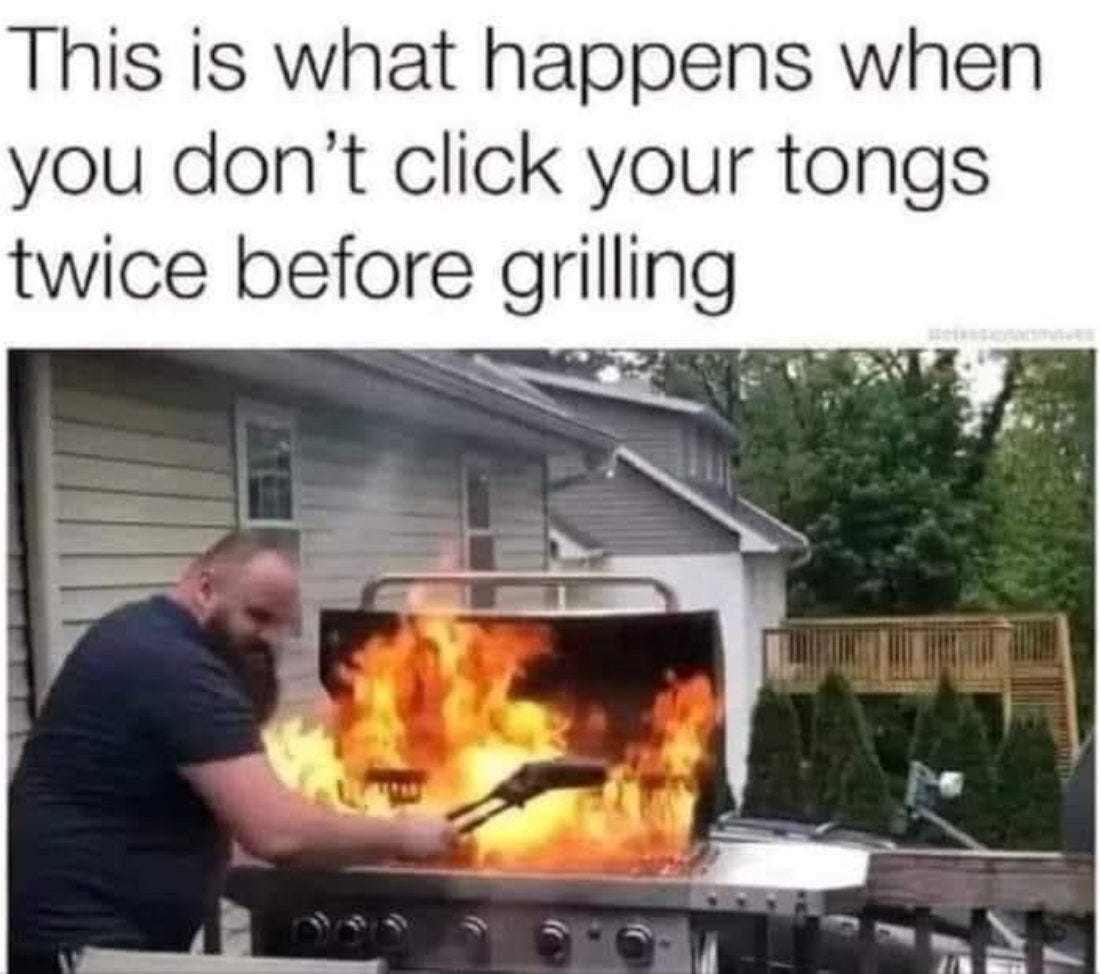 May be an image of ‎1 person, fire and ‎text that says '‎This is what happens when you don't click your tongs twice before grilling Lי‎'‎‎