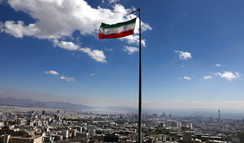 Iran's national flag waves in northern Tehran, Iran, March 31, 2020. (AP)