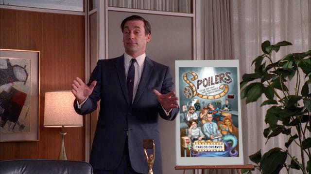 Don Draper from Mad Men standing in front of a poster board with the cover of Spoilers photoshopped onto it